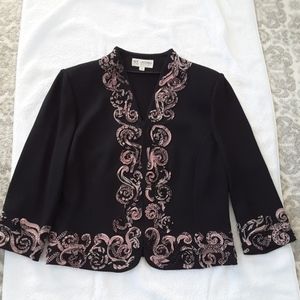 St. John Ladies, size 12 black trimmed jacket.